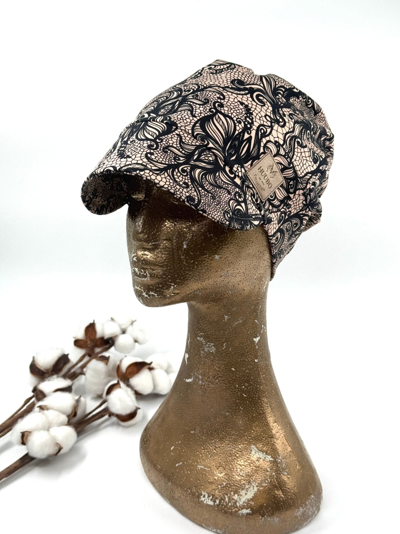 Naisten lippapipo kuviolla, beige-musta