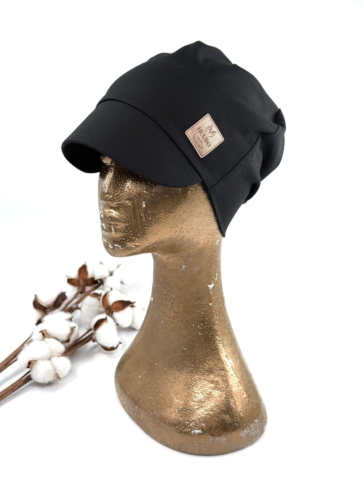 Naisten musta lippapipo