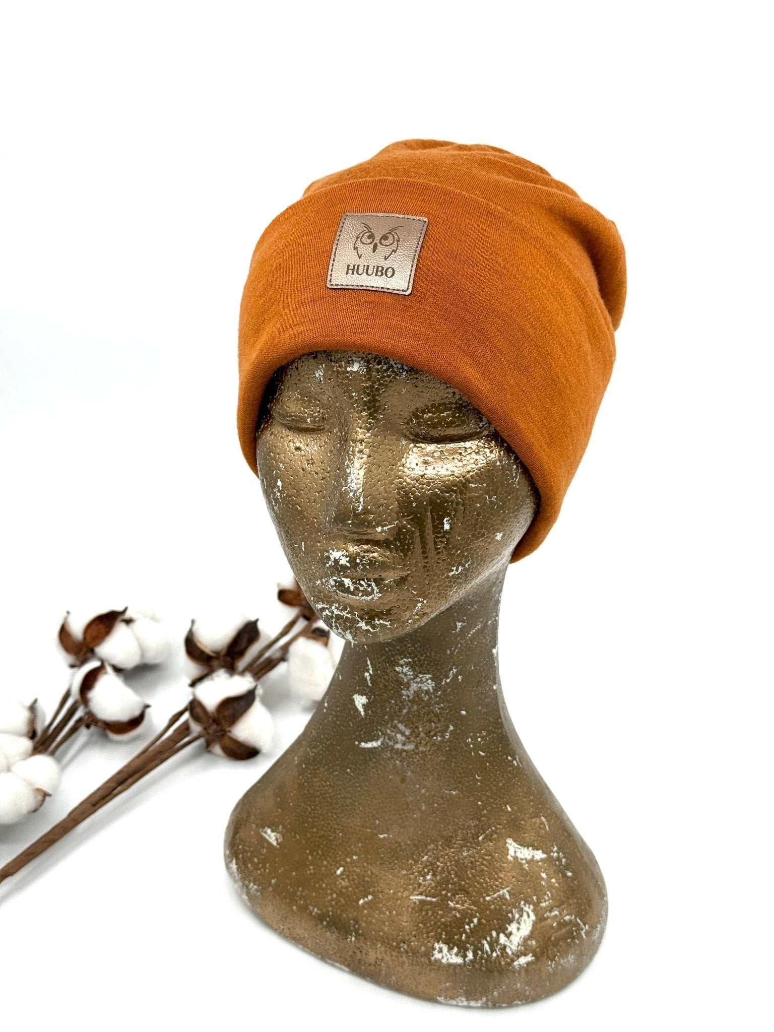 Merinovillainen monitoimipipo, oranssi ponnaripipo.